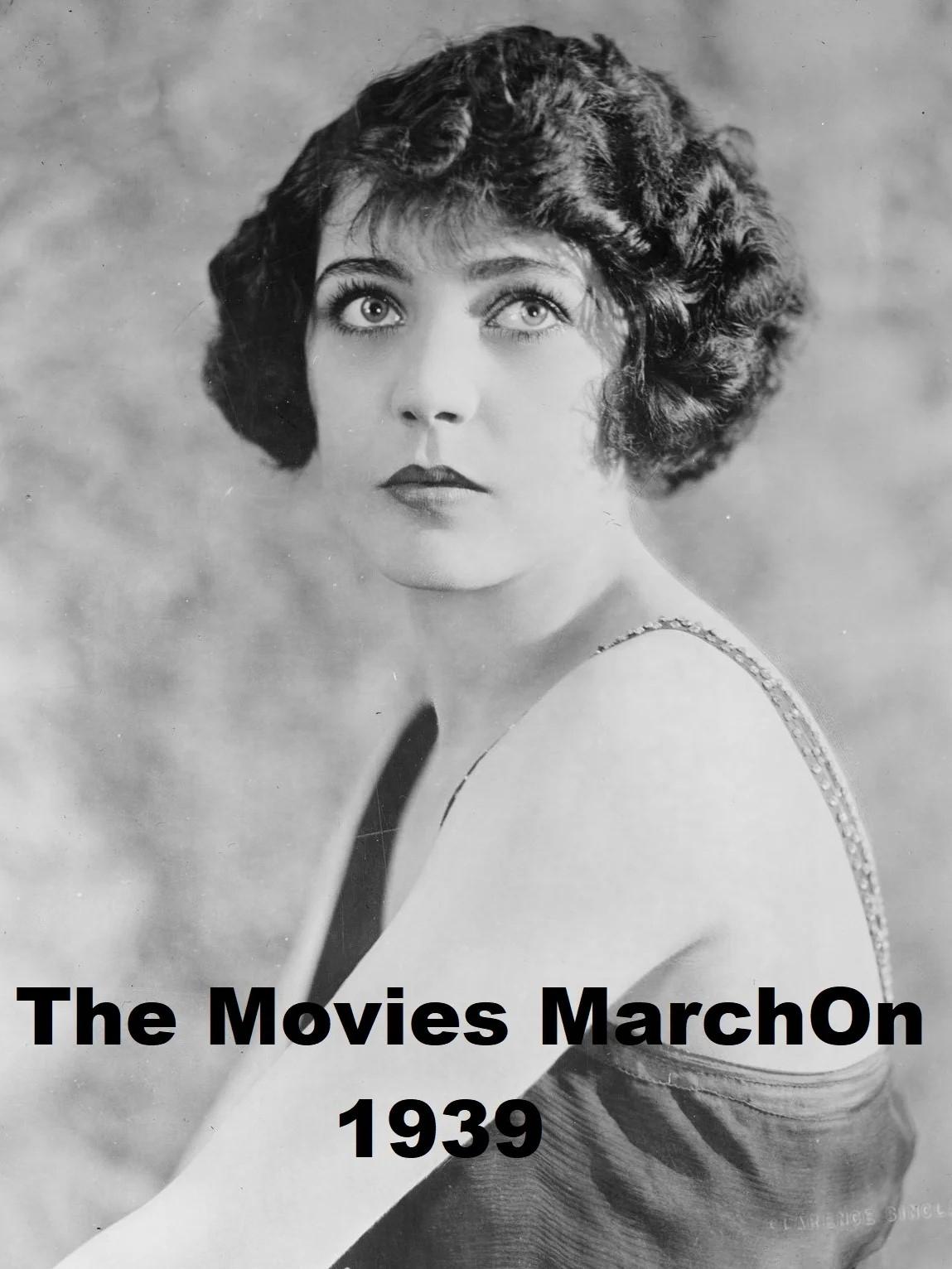 Постер The Movies March On